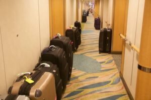 Checked luggage can take hours to reach your cabin after you board the ship.. Source: Royal Caribbean Blog
